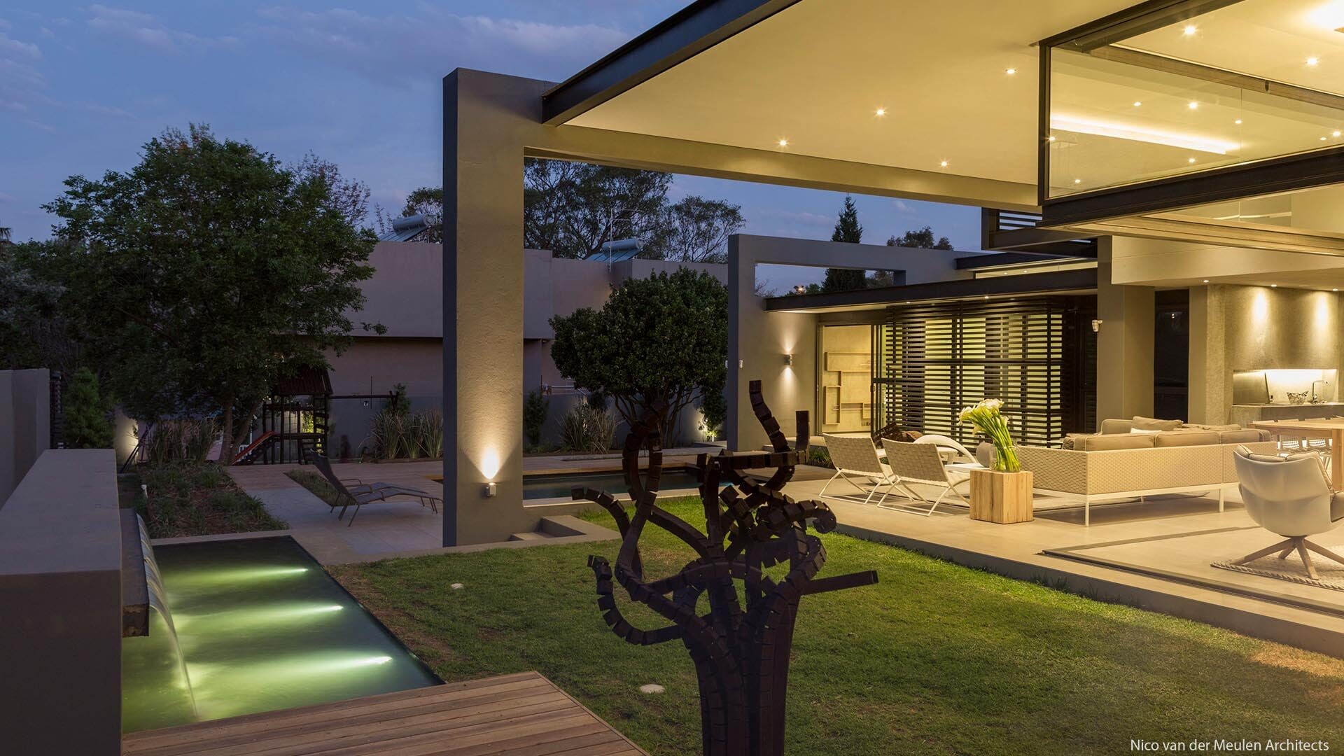 Corporate and residential project lighting design for an outdoor patio and pool area in Sandton